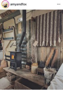 Interior of Eriba caravan, showing woodburner. Photo from Instagram (Amy & Fox).
https://www.instagram.com/p/DKkj8ZWND1I/?utm_source=ig_web_copy_link&igsh=MWVjNnEwNmJiNXN2cQ==